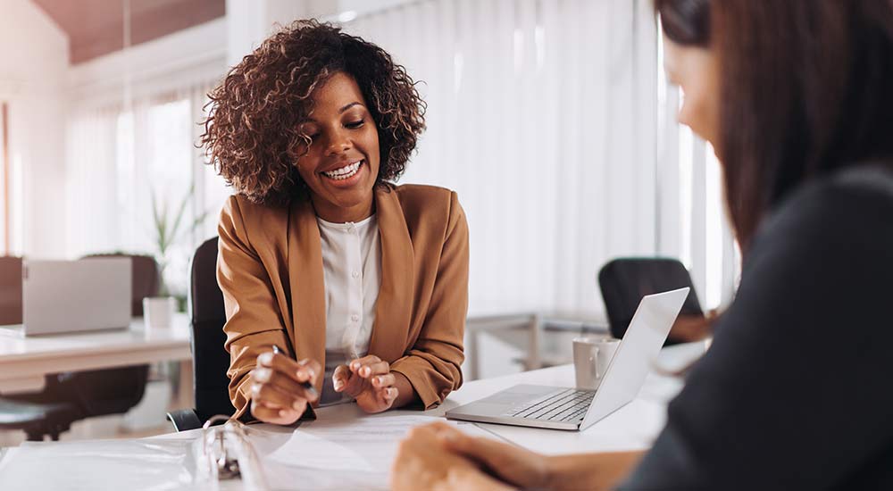 Woman meeting with insurance agent