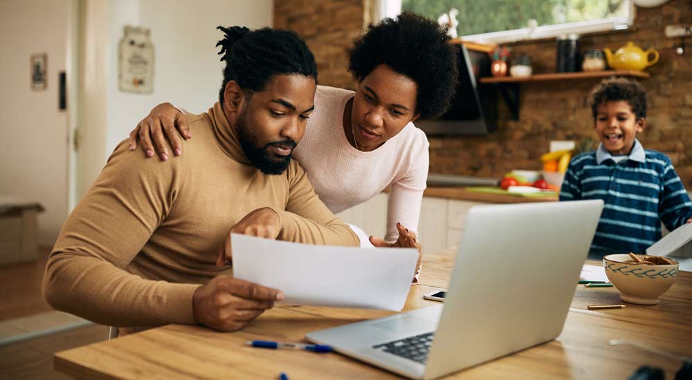 Family looking at insurance policy