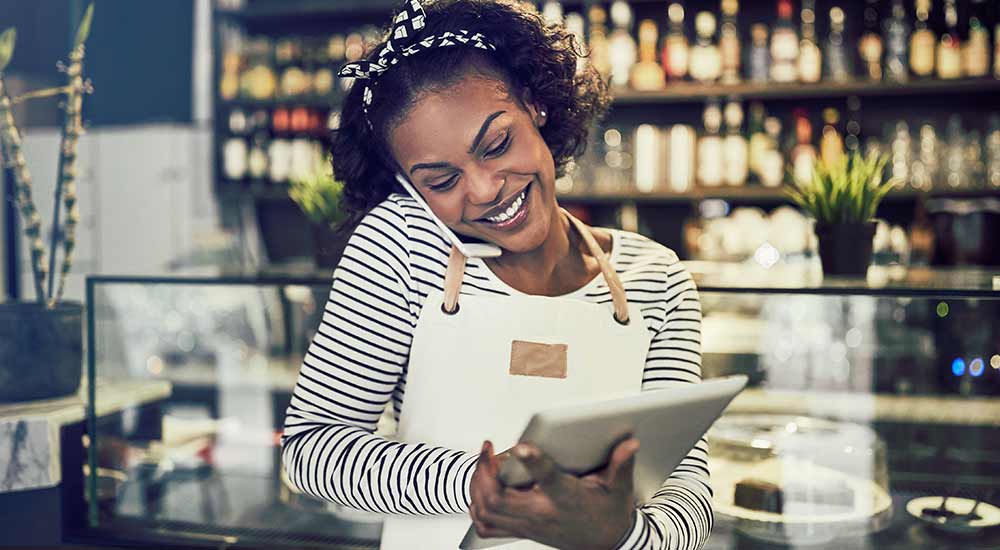 Business owner on her mobile devices