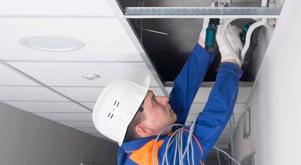 Technician fixing cable wire 