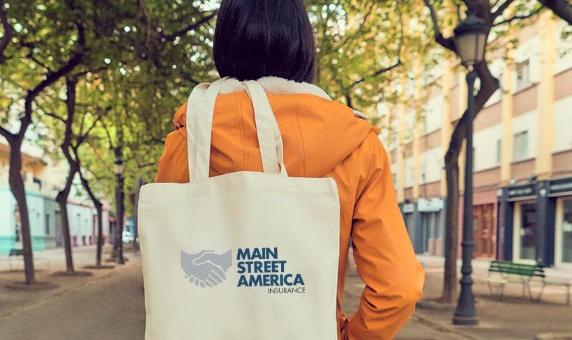 Woman with a Main Street America bag